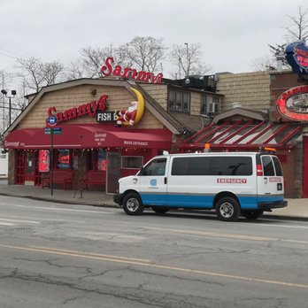 Sammys Fish Box - Sammy's posing with Con Ed. - Seafood Near Me - Bronx, New York Sammys Fish Box - Sammy's posing with Con Ed. - Seafood Near Me - Bronx, New York