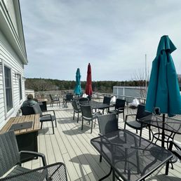Spacious outdoor dining patio w/ water view