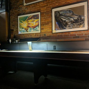 Sullivan's Bar - a man standing at the bar - Sports Bars Near Me - Omaha, Nebraska