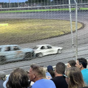 Orlando Speed World Oval Track - Roller Derby Race, front car is pushed around the track - Tour of Destruction - Orlando, Florida Orlando Speed World Oval Track - Roller Derby Race, front car is pushed around the track - Tour of Destruction - Orlando, Florida