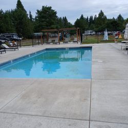 Albany / Corvallis KOA - Brown stained pool.