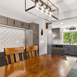 The Porchlight Group - eXp Realty - Meticulously remodeled dining area listing in Newcastle, WA. Available for a tour!