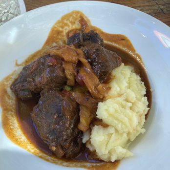 Fiorito - Brasied short ribs a la riojana . mash potato / bell peppers / green peas / fried egg - Argentine Near Me - Miami, Florida