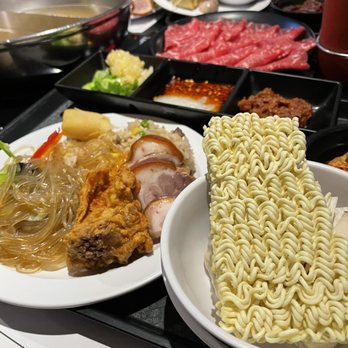Dada Shabu Shabu Buffet - My cooked sides and ramen to add to my broth. - Korean Near Me - Irvine, California