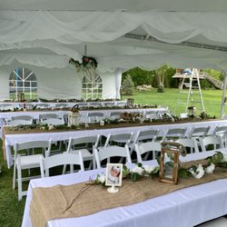 Heartland Tents & Event Rentals - 20x60 high peak with pole drapes, sidewalls, and garden chairs