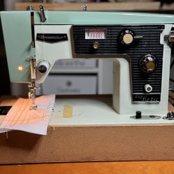 Arias Sewing Machines - Dressmaker Super Zig Zag needed work on the tension and they cleaned her up. She's so pretty and works like a dream now.