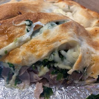 Crown Pizza - Spinach, Sausage and Mushroom Calzone - Pizza Near Me - Waterford, Connecticut Crown Pizza - Spinach, Sausage and Mushroom Calzone - Pizza Near Me - Waterford, Connecticut