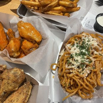 Fire Wings - Howe - LRG - GARLIC NOODLES  Lemon pepper wings  LRG - SEASONED FRIES 8 WING COMBO - Chicken Wings Near Me - Sacramento, California