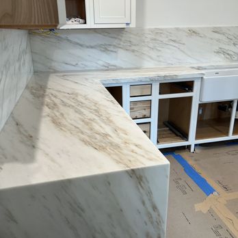 Russo Tile & Marble - Marble countertops/splash and water fall - General Contractors Near Me - El Cajon, California Russo Tile & Marble - Marble countertops/splash and water fall - General Contractors Near Me - El Cajon, California
