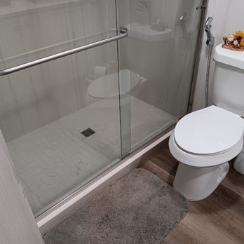 Home Fix Brothers - a toilet and shower in a bathroom - Countertop Installation Near Me Home Fix Brothers - a toilet and shower in a bathroom - Countertop Installation Near Me