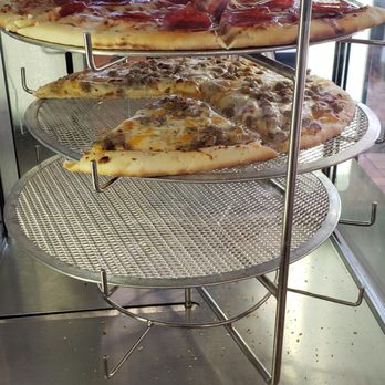 Speedway - a display of pizzas in a restaurant - Convenience Stores Near Me - Madison, Wisconsin Speedway - a display of pizzas in a restaurant - Convenience Stores Near Me - Madison, Wisconsin