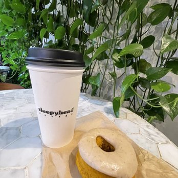 Sleepyhead Coffee - Hot dirty pumpkin chai latte with oat milk and a pumpkin spice donut. - Coffee & Tea Near Me - Chattanooga, Tennessee Sleepyhead Coffee - Hot dirty pumpkin chai latte with oat milk and a pumpkin spice donut. - Coffee & Tea Near Me - Chattanooga, Tennessee