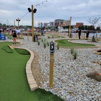 Oliver's Bayfront Mini Golf - No windmills or other structures. Great views of lighthouse, US Niagara, and Lake Erie - Music Venues Near Me - Erie, Pennsylvania Oliver's Bayfront Mini Golf - No windmills or other structures. Great views of lighthouse, US Niagara, and Lake Erie - Music Venues Near Me - Erie, Pennsylvania