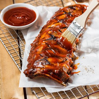 Tony Roma's - a rack of ribs with barbecue sauce - Steakhouses Near Me - Lethbridge, Alberta Tony Roma's - a rack of ribs with barbecue sauce - Steakhouses Near Me - Lethbridge, Alberta