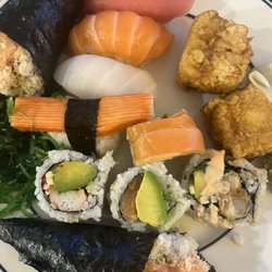 Mikado Sushi and Thai - Spicy salmon hand rolls, assorted sushi and rolls, age dashi tofu and seaweed salad.