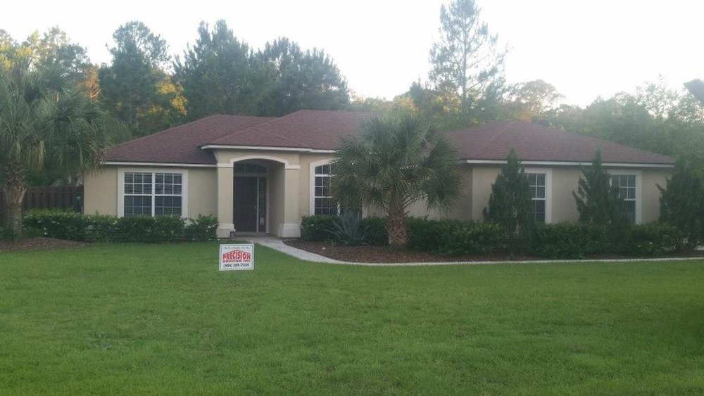 Slide of Precision Roofing