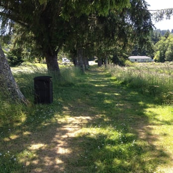 Rovers RV Park - Path from the off leash area towards the RV's - RV Parks Near Me - Waldport, Oregon Rovers RV Park - Path from the off leash area towards the RV's - RV Parks Near Me - Waldport, Oregon