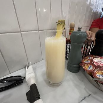 Mornings Breakfast & Brunch - Piña colada mimosa-the star of the show - Breakfast & Brunch Near Me - Indianapolis, Indiana