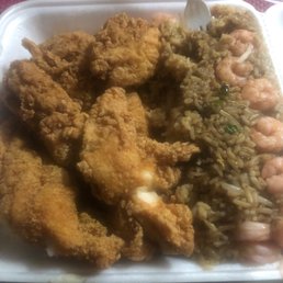 Catfish and chicken strips with shrimp fried rice Catfish and chicken strips with shrimp fried rice