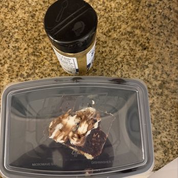Angelo's Pizza and Pasta - Tiramisu w/spice jar and coffee cup in background to show small size for $8 price and overwhelming amount of chocolate syrup - Pizza Near Me - Webster, Texas Angelo's Pizza and Pasta - Tiramisu w/spice jar and coffee cup in background to show small size for $8 price and overwhelming amount of chocolate syrup - Pizza Near Me - Webster, Texas