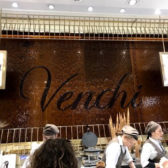 Venchi - Chocolate fondu wall - Ice Cream & Frozen Yogurt Near Me - Rome, RM Venchi - Chocolate fondu wall - Ice Cream & Frozen Yogurt Near Me - Rome, RM
