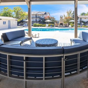 Eagles West - Poolside lounge area with shaded pavilion at Eagles West Apartments in Auburn, AL. - Apartments Near Me - Auburn, Alabama Eagles West - Poolside lounge area with shaded pavilion at Eagles West Apartments in Auburn, AL. - Apartments Near Me - Auburn, Alabama