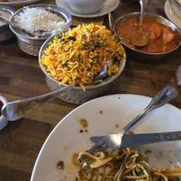 Veggie chow mein, chicken biryani, chicken tikka masala (also partially devoured) Veggie chow mein, chicken biryani, chicken tikka masala (also partially devoured)