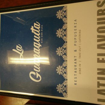La Guanaquita - a blue and white sign - Salvadoran Near Me - Toronto, Ontario