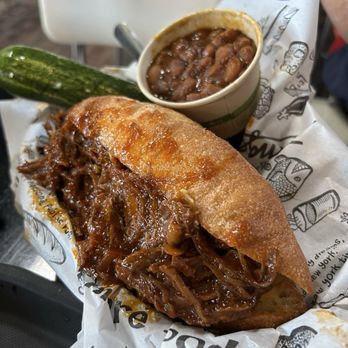 Zingerman's Delicatessen - Boisterous Brisket with a new pickle and like homemade baked beans - Delis Near Me - Ann Arbor, Michigan Zingerman's Delicatessen - Boisterous Brisket with a new pickle and like homemade baked beans - Delis Near Me - Ann Arbor, Michigan