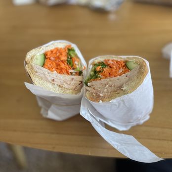 Mr Banh Mi - a sandwich cut in half on a table - Vietnamese Near Me - San Francisco, California Mr Banh Mi - a sandwich cut in half on a table - Vietnamese Near Me - San Francisco, California