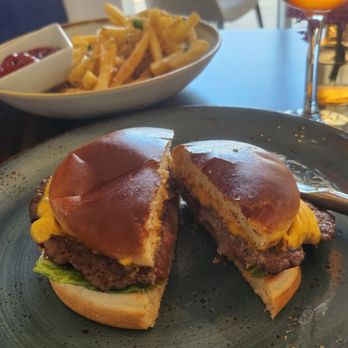 One Ocean Resort & Spa - Hapot Hour smash burgers for lunch. Yum - Hotels Near Me - Atlantic Beach, Florida One Ocean Resort & Spa - Hapot Hour smash burgers for lunch. Yum - Hotels Near Me - Atlantic Beach, Florida