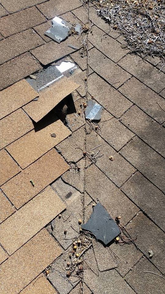 Slide of Camelot Roofing