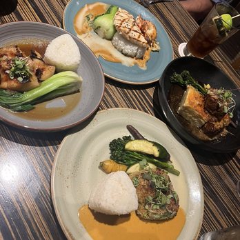 Roy's Kaanapali - Butterfish (bottom left) and macadamia ono (bottom right) - Hawaiian Near Me - Lahaina, Hawaii Roy's Kaanapali - Butterfish (bottom left) and macadamia ono (bottom right) - Hawaiian Near Me - Lahaina, Hawaii