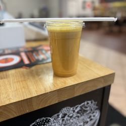 Ten10 Restaurant - Vitamin C booster with orange juice, red, apple, pineapple, lemon, and ginger