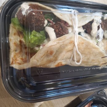 Santorinis  - West Bountiful - Falafel in a pita wrap with pickled onions, green lettuce garlic sauce - Greek Near Me - West Bountiful, Utah