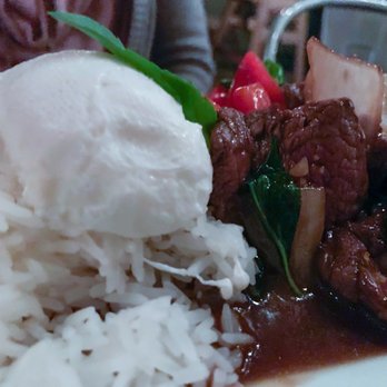 Bida Manda - Basil beef stir fry featuring the poached egg which makes the dish - Laotian Near Me - Raleigh, North Carolina