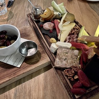 Alta Bistro - Roasted olives and charcuterie board - French Near Me - Whistler, British Columbia Alta Bistro - Roasted olives and charcuterie board - French Near Me - Whistler, British Columbia