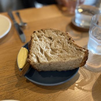 Bastible - Signature sourdough bread and cultured butter (€85 tasting menu) - Modern European Near Me - Dublin, D Bastible - Signature sourdough bread and cultured butter (€85 tasting menu) - Modern European Near Me - Dublin, D