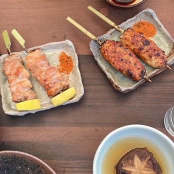 Rintaro - Yakitori momo sansho (left) and Yakitori tsukune with egg yolk (right) - Izakaya Near Me - San Francisco, California Rintaro - Yakitori momo sansho (left) and Yakitori tsukune with egg yolk (right) - Izakaya Near Me - San Francisco, California