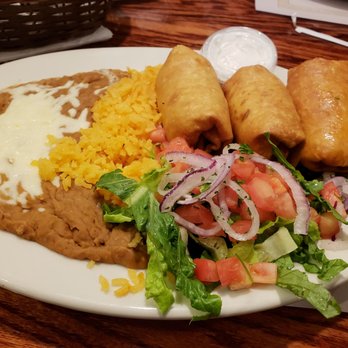 Omega  Restaurant - The Shrimp Chimichanga dinner which includes a side of sour cream, rice, refried beans and a salad. Definitely recommend the chimichangas! - Greek Near Me - Milwaukee, Wisconsin