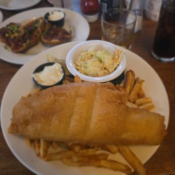 O'Malley's On Main - Fish & Chips LOOK at the size of that fish. Super crispy batter, piping hot, flaky inside and easily my favorite thing on the menu. - Irish Near Me - Seal Beach, California O'Malley's On Main - Fish & Chips LOOK at the size of that fish. Super crispy batter, piping hot, flaky inside and easily my favorite thing on the menu. - Irish Near Me - Seal Beach, California