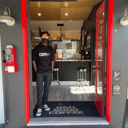 Exterior outside entrance of Dam Good Coffee - The man! Aka Joshua - Los Angeles, California Exterior outside entrance of Dam Good Coffee - The man! Aka Joshua - Los Angeles, California