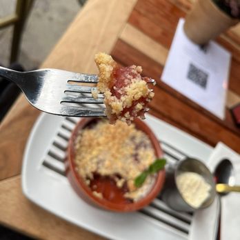 The Red Lion - Apple and Damson Crumble with vegan vanilla ice cream. - British Near Me - Oxford, OXF The Red Lion - Apple and Damson Crumble with vegan vanilla ice cream. - British Near Me - Oxford, OXF