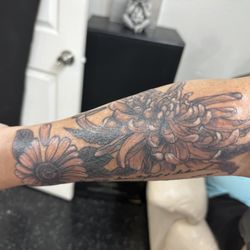 G's Tattoos & Smoke Shop - Mine and my dad's birth flowers