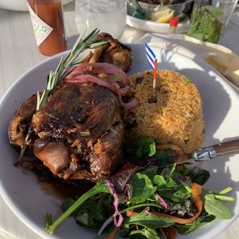 Zona De Cuba - Pernil with a side salad and rice and beans. - Cuban Near Me - Bronx, New York Zona De Cuba - Pernil with a side salad and rice and beans. - Cuban Near Me - Bronx, New York