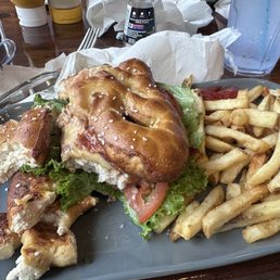Butterfly Chicken Club and french fries. Butterfly Chicken Club and french fries.
