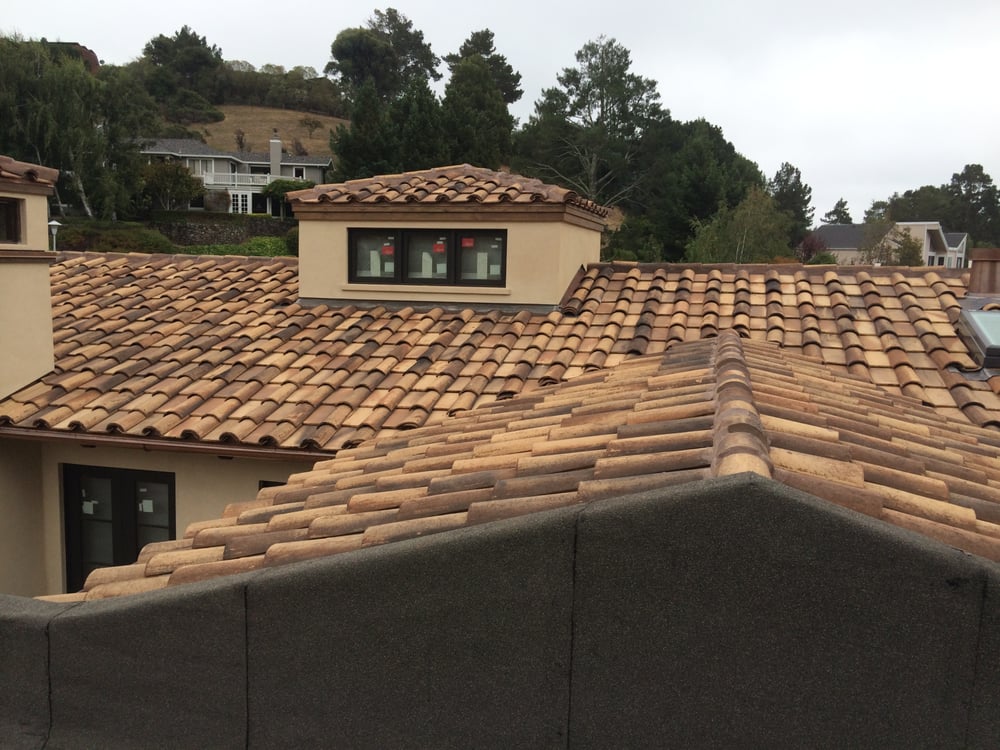 Slide of Gutierrez Roofing Company