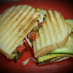 Aromas - Melanzana panini. A vegetarian delight! With Eggplant, yellow squash, zucchini, red bell pepers, pesto and mozzarella cheese.