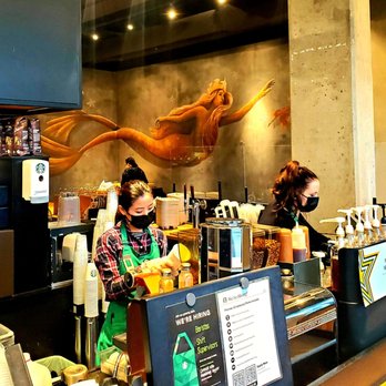 Starbucks - OMG ... it's her ... the divine Starbucks Siren! She's floating around on the wall! I'ma try & get a pic with her! She's so amazing! - Coffee & Tea Near Me - Vancouver, British Columbia Starbucks - OMG ... it's her ... the divine Starbucks Siren! She's floating around on the wall! I'ma try & get a pic with her! She's so amazing! - Coffee & Tea Near Me - Vancouver, British Columbia