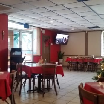 La Isla Restaurant - tables and chairs with red tablecloths - Mexican Near Me - Arlington, Texas La Isla Restaurant - tables and chairs with red tablecloths - Mexican Near Me - Arlington, Texas